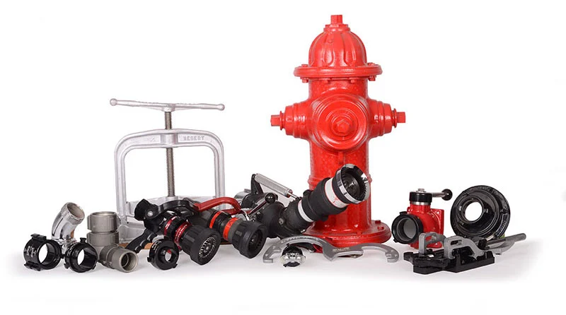  red fire hydrant with multiple fire hose connectors attached